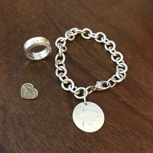Tiffany & Co. bracelet, ring, and single earring